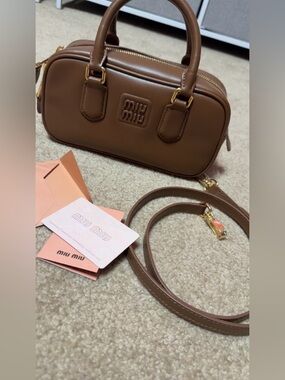 Designer-inspired brown handbag with straps
